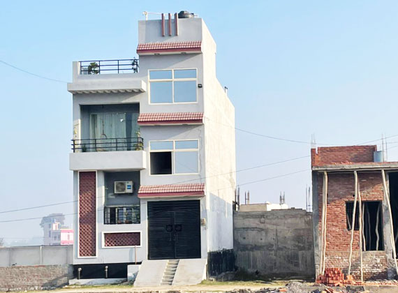 Contemporary luxury home exterior with large glass windows and modern design